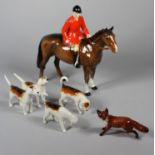 A Beswick hand painted ceramic figure ' Huntsman ' Red Jacket, model 1501, designer A. Gredington,