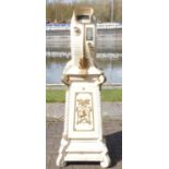 A good late 19th century/early 20th century American white painted cast iron Clam Shell Mutoscope,