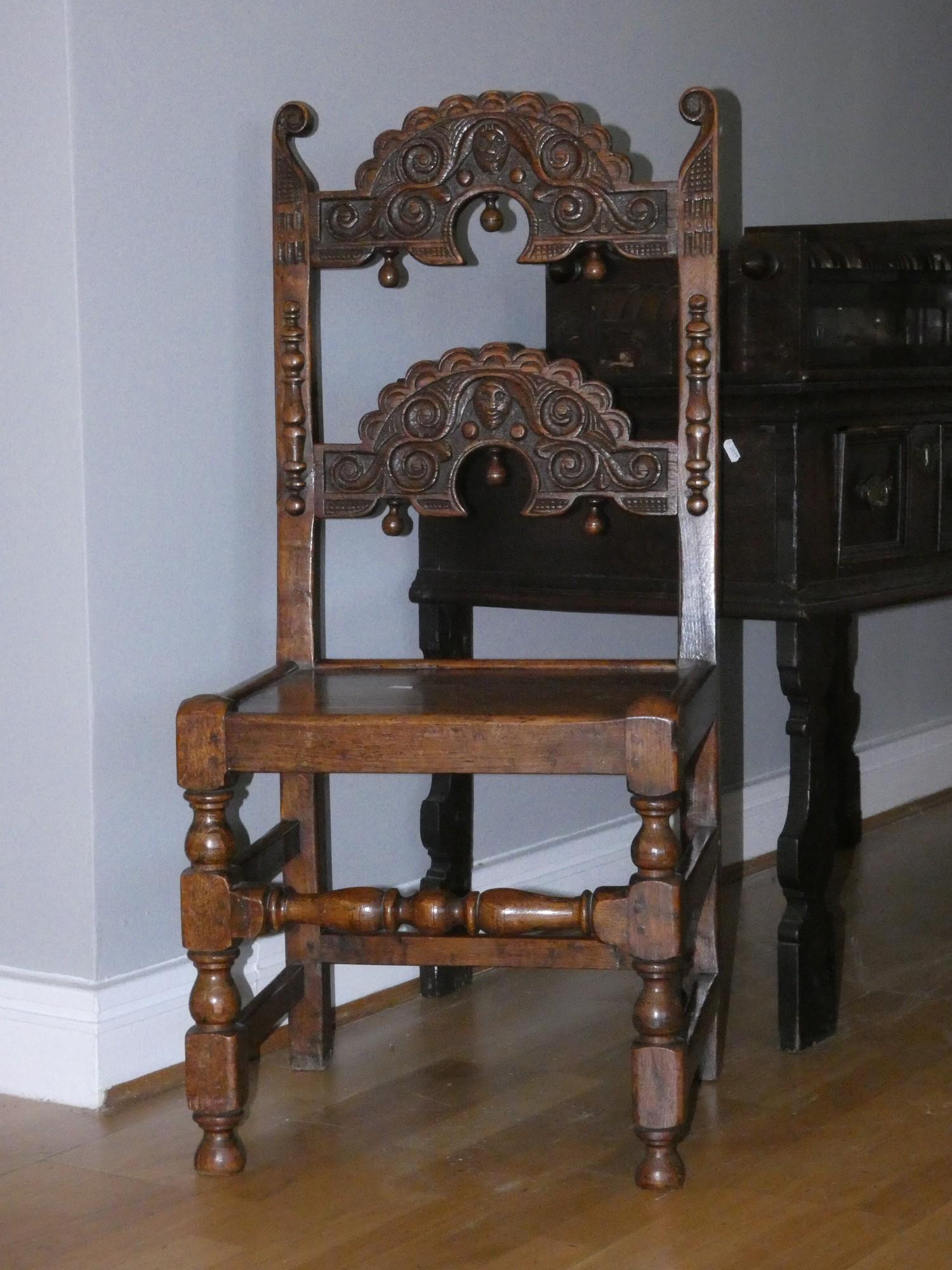 A 19th century and later oak Yorkshire chair, with two carved back rails.