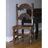 A 19th century and later oak Yorkshire chair, with two carved back rails.
