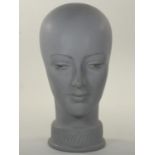 A pottery head of a female, impress RADIUM, 30cm.