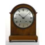 An Edwardian mahogany and boxwood strung mantle clock, with silvered dial, the movement by