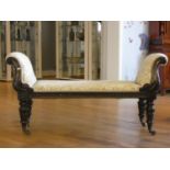 A Victorian mahogany window seat, with upholstered set and arms, raised on brass castors, 130 x 43 x