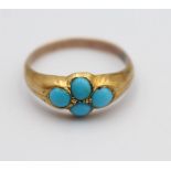 A Victorian gold and turquoise quatrefoil ring, size O 1/2 and a n Edwardian emerald and diamond