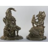 A cast iron pair of door stops, in the form of Punch and Judy, later painted, 32 cm.