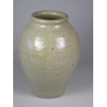 Unknown, a light green stoneware glazed vase with brown details and whale carved into side, height