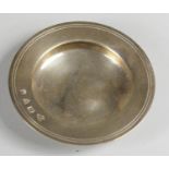 A silver armada dish, by Wakeley & Wheeler, Chester 1962, of plain form, diameter 11 cm, 3 oz. The