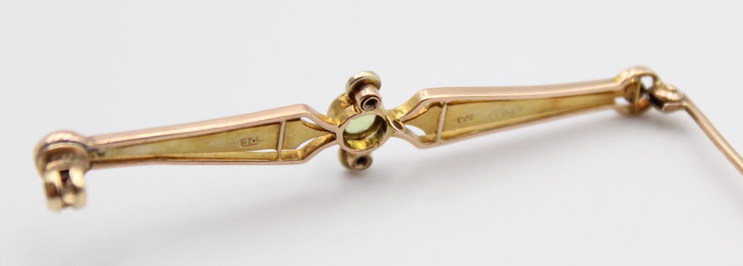 A Victorian gold and half pearl bar brooch, with trefoil designs and a 9ct gold peridot and pearl - Image 4 of 11