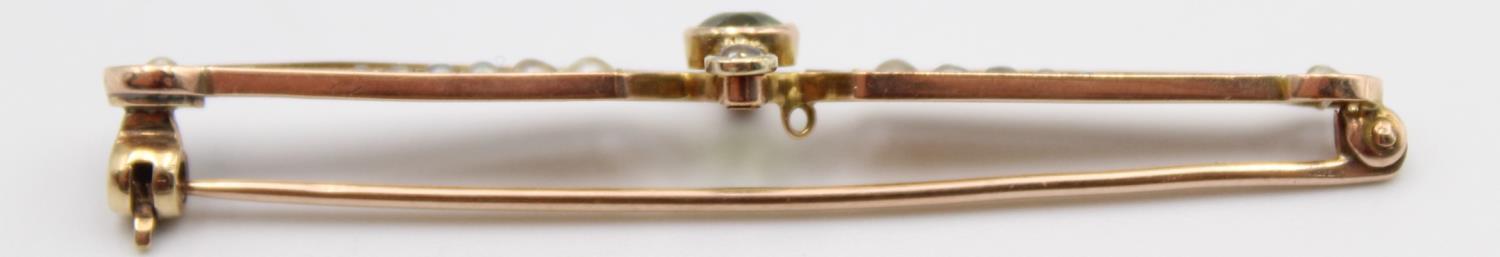 A Victorian gold and half pearl bar brooch, with trefoil designs and a 9ct gold peridot and pearl - Image 6 of 11