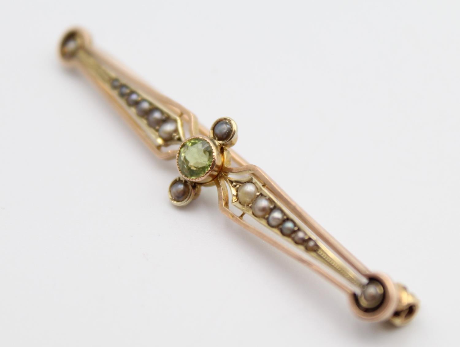 A Victorian gold and half pearl bar brooch, with trefoil designs and a 9ct gold peridot and pearl - Image 8 of 11