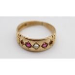 A Victorian 15ct gold, ruby and half pearl ring, Chester 1889, lacking two pearls, size M, 3.5 gms.