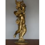 A gilt resin figure of a cherub, 140 cm.