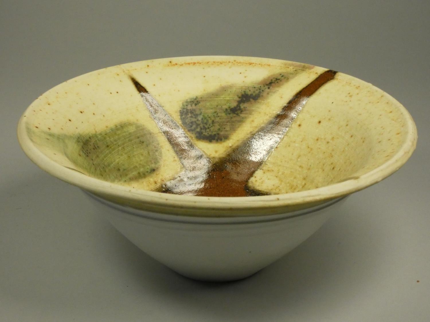 Charles Bound (b.1939), a set of three small bowls with two white bases and brown and green