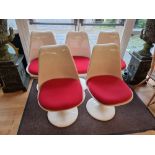 A set of five resin retro style swivel dining chairs