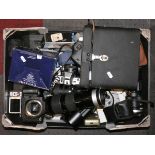 A collection of 35mm film cameras and lenses to include- Minolta X-300, Sigma 28-70mm lens, Pentax
