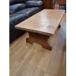 A solid oak hand finished coffee table, 122 x 60 x 45 cm.