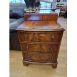 A mahogany bow front chest of three drawers, 54 x 41 x 66 cm.