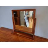 A teak dressing table swing mirror, 60 x 60 cm.