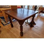 An oak extending dining table, 90 x 90 (extending to 160) x 75 cm.