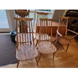 A set of 4 Ercol Goldsmith Windsor stripped elm and beech dining chairs stamped BS 1960 and 2055,