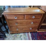 A pine chest of two short over three long drawers, 101 x 46 x 81 cm.