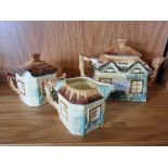 A three piece Cottage Keele Street Staffordshire pottery tea service