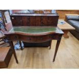 A reproduction mahogany serpentine front ladies writing desk, with green leather inserts, 91 x 50