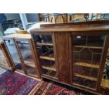 A mahogany display cabinet with leaded glass doors 106 x 30 x 110 cm and a bookcase top