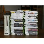 An XBOX 360 console complete with games, controllers, headphones and cables.