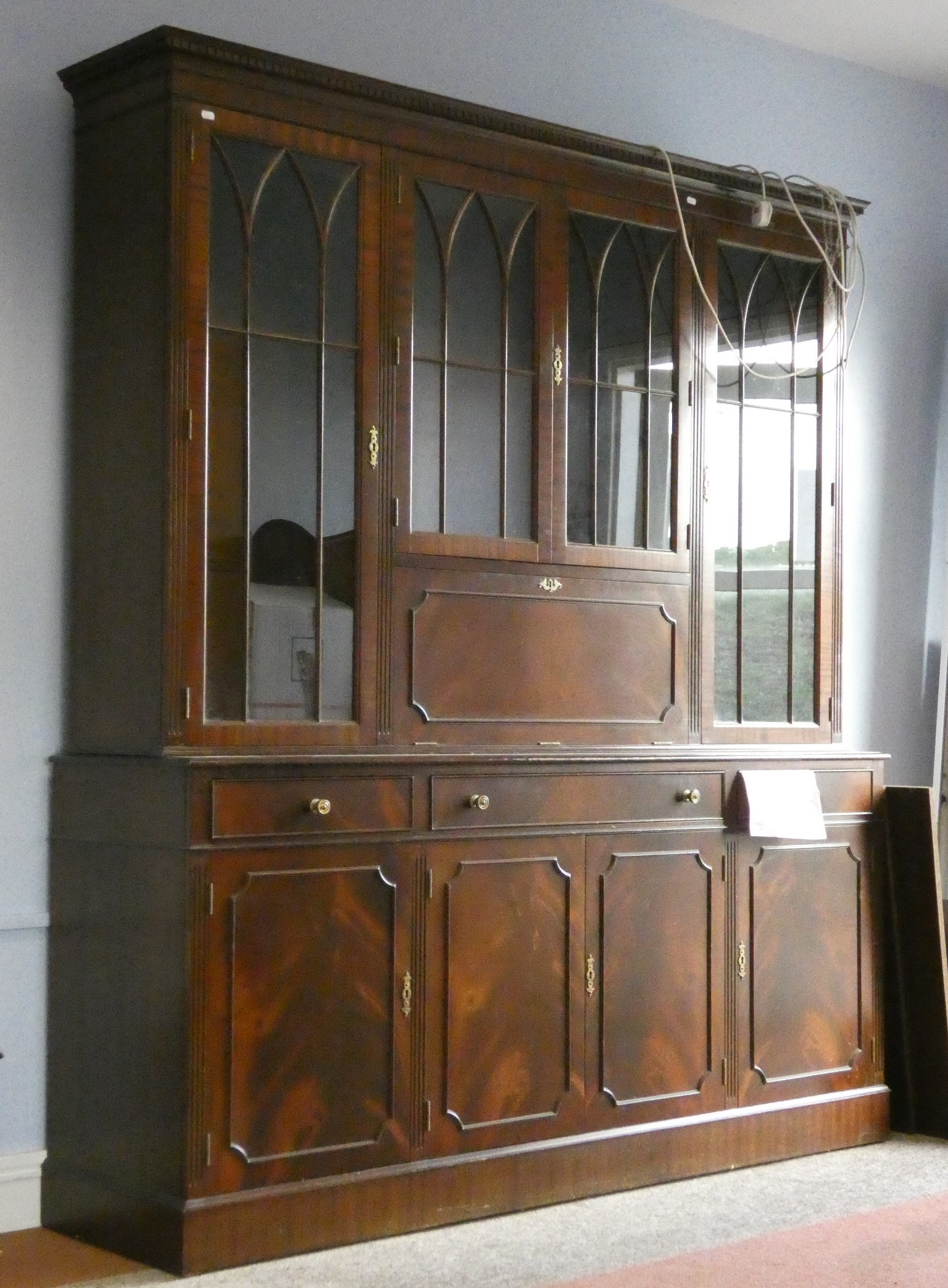 A mahogany display cabinet