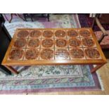 A Danish teak and tiled coffee table, stamped to the underside, 130 x 70 x 40 cm