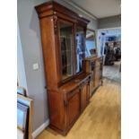 A Victorian mahogany glazed bookcase cabinet, with two frieze drawers over cupboard doors, 121 x