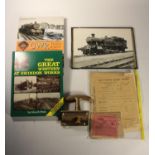 A box of sundry items to include- Brass carriage door handle stamped GWR, official Swindon sepia