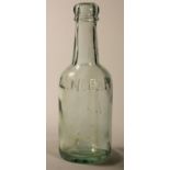 Two 1/2 pint railway beer bottles, G.C.R green glass, LNER clear glass, both stamped with railway