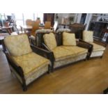 A three piece bergere suite consisting of a 2 seater sofa and 2 matching single chairs.seat height