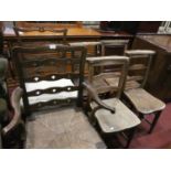 A harliquinn set of four early school chairs, together with a rush seated carver chair and a oak