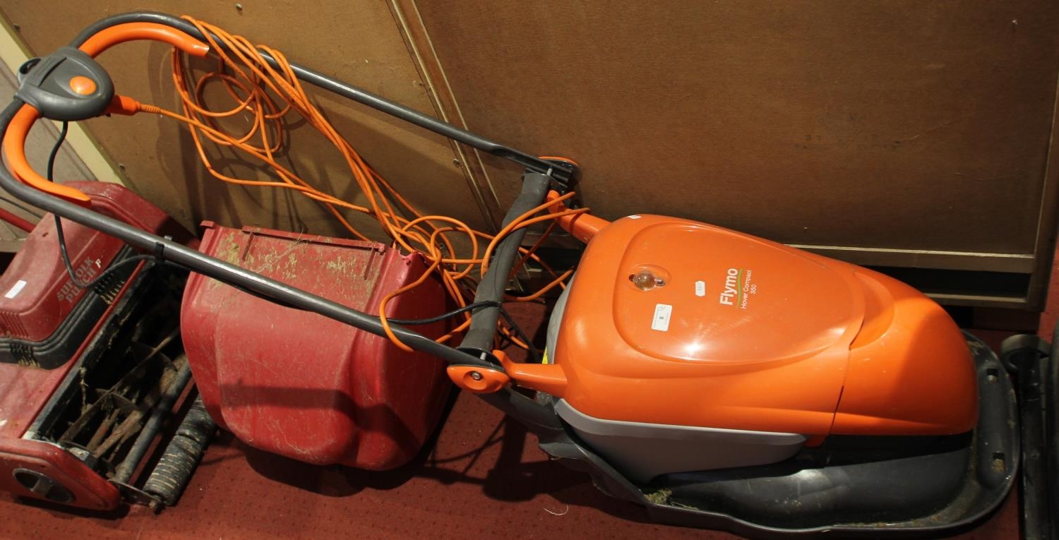 A Flymo hover mower together with a Suffolk Punch electric rotary mower (2)