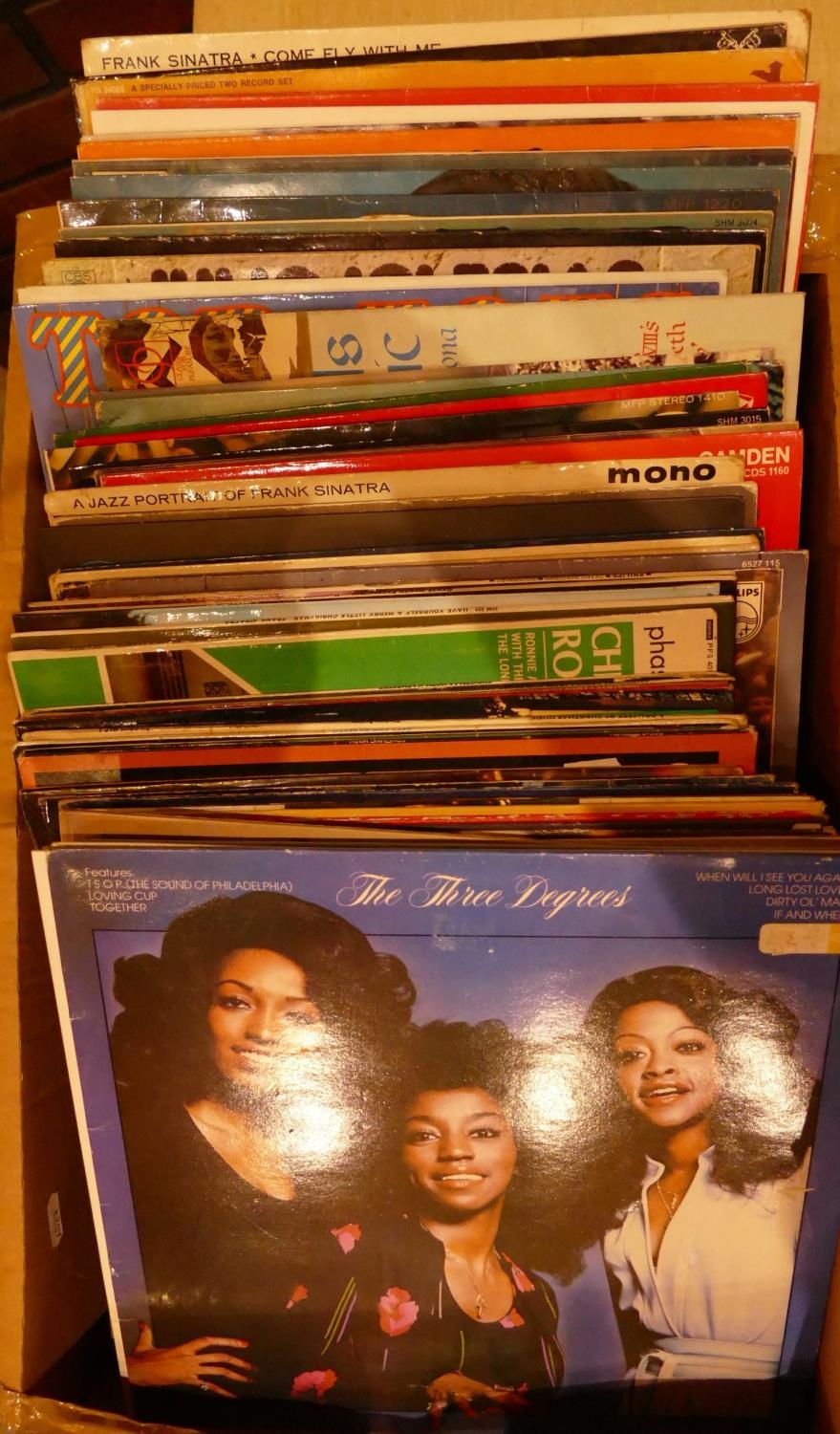 A collection of Vinyl 33 RPM records including- BoneyM, ABBA, Elvis, Frank Sinatra and others.