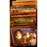 A collection of Vinyl 33 RPM records including- BoneyM, ABBA, Elvis, Frank Sinatra and others.