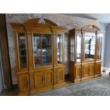 To match the previous lot- A pair of burr yew and yew wood display cabinets, the central beveled