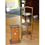 An oak mid 20th century three tier folding cake stand, together with a oak umbrella stand with