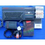 A Spectrum ZX +2A console (black) S No U083443 with power supply unit, TV lead, joystick, manual and