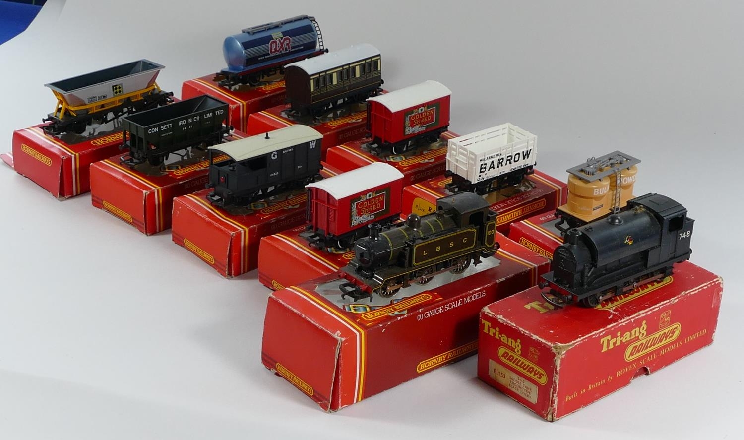 A collection of eleven boxed model railway including Tri-ang Hornby 0-6-0 Saddle Tank Locomotive