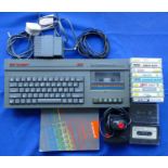 A Spectrum +2 games console (grey) S. No 066657 T complete with power supply unit, TV lead,