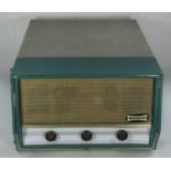 A 1950s Dansette portable record player.