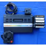 An Atari 2600 games console S No X19A3637589 together with a power supply, joystick, TV lead and