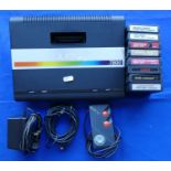 An Atari 7800 games console S No X10A3017658 complete with power unit, TV lead, mini-stick pad