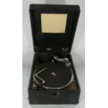 An early 20th Century portable wind up gramophone together with a collection of guitar tutorial