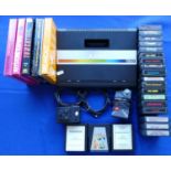 An Atari 7800 games console S No X9383220356 with power supply, TV lead, mini-stick control pad