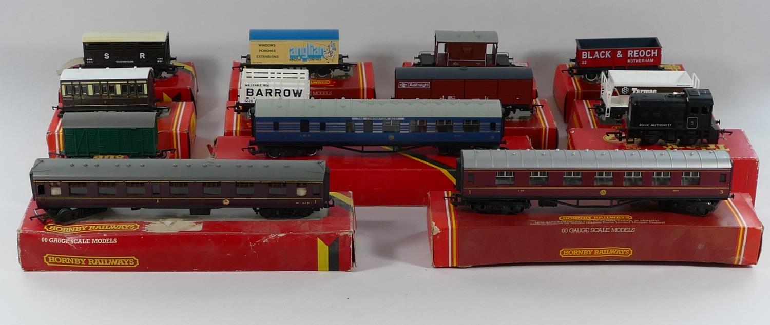 Twelve boxed Tri-ang and Hornby railway models to include- 'Black & Reoch' Mineral Wagon (R.021), '